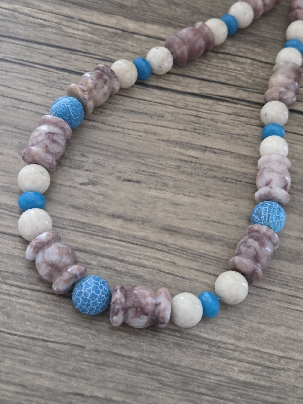 Blue and Cream Beaded Necklace with Marbled Mauve Accents